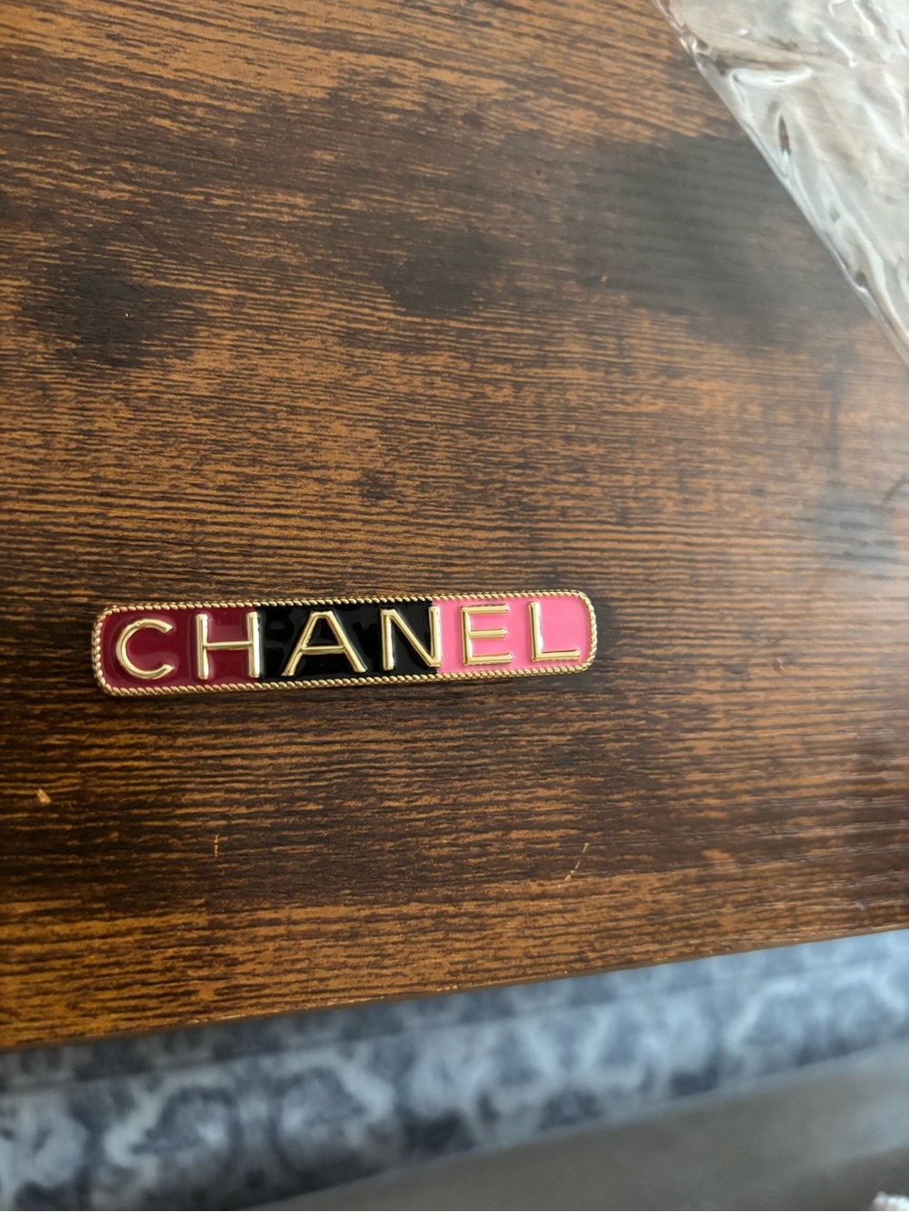 CHANEL Pink and Black Logo Enamel Pin with Gold Trim gentle used